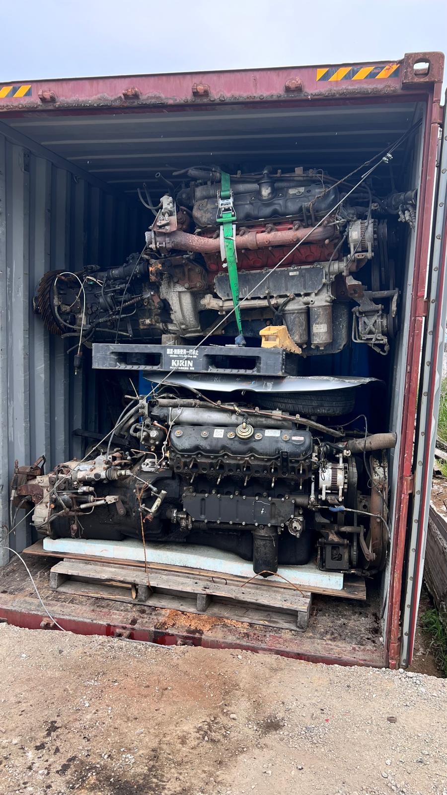 Engine fans & Isuzu cab — export container
