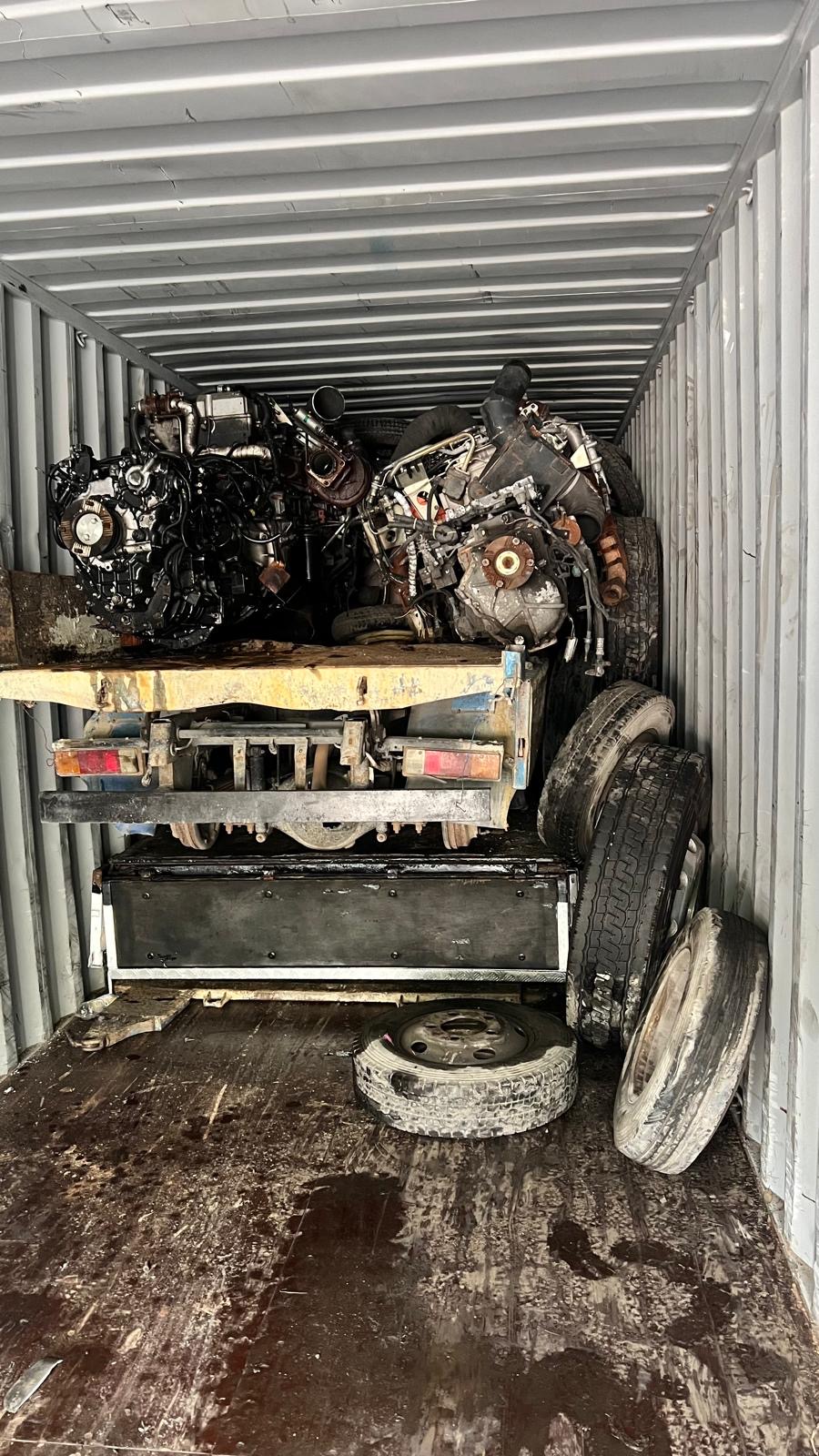 Isuzu Elf stripped bodies — stacked and exported