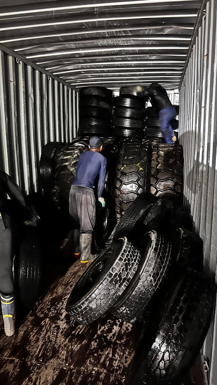 Two containers — used tyre delivery, destination port