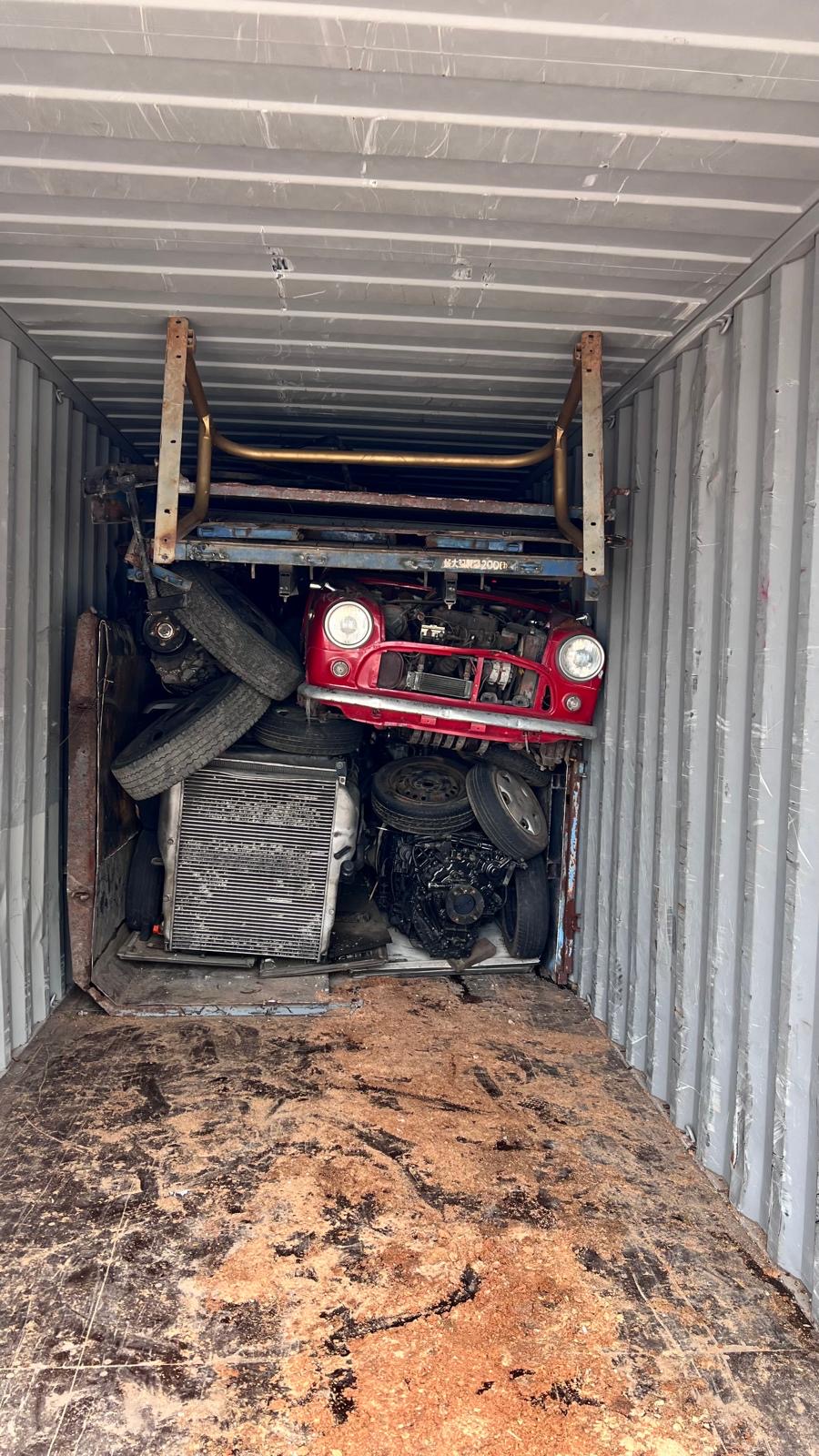Isuzu Elf + engine fans — container load