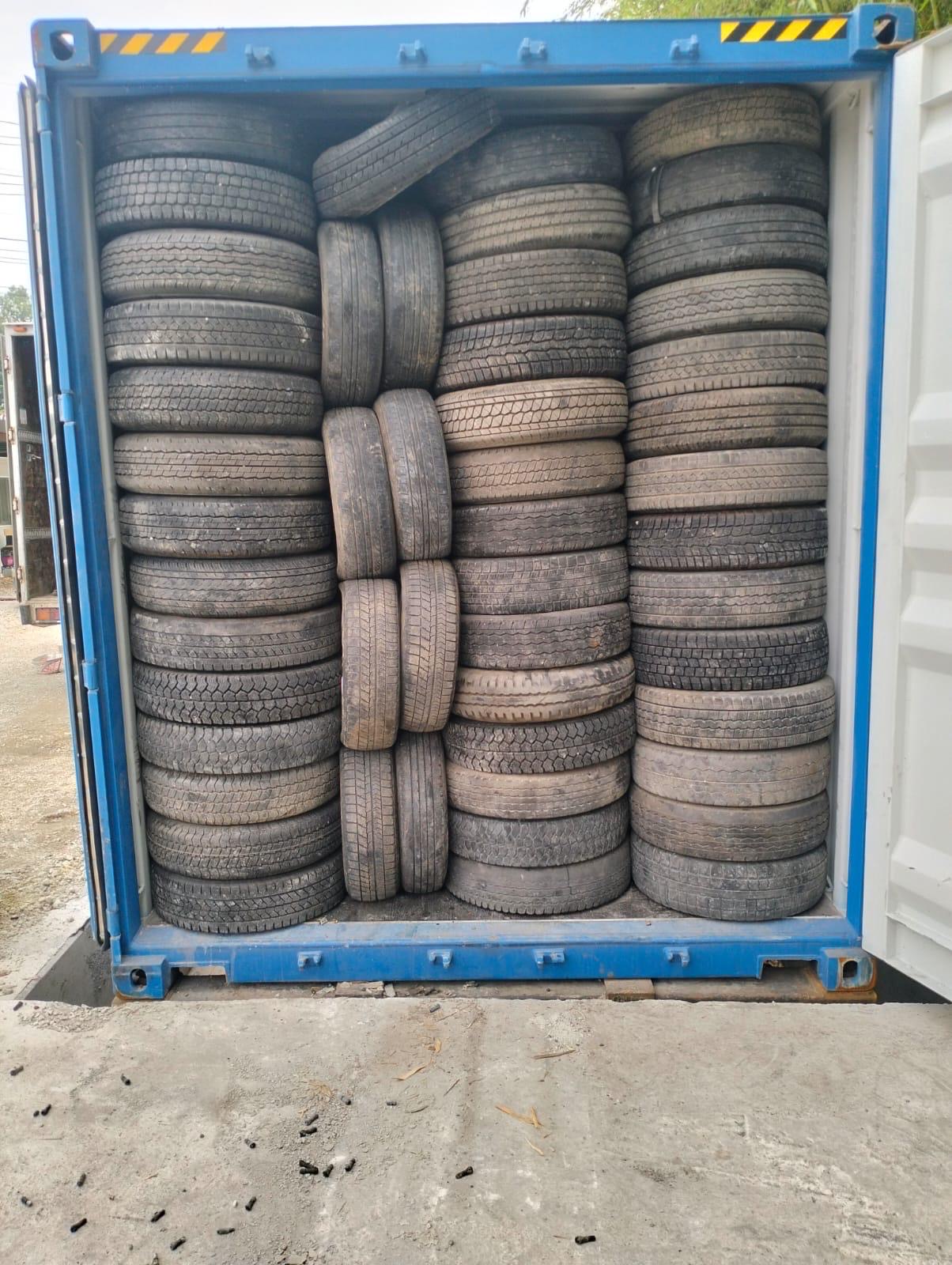 Massive tyre yard — open-air stock Japan