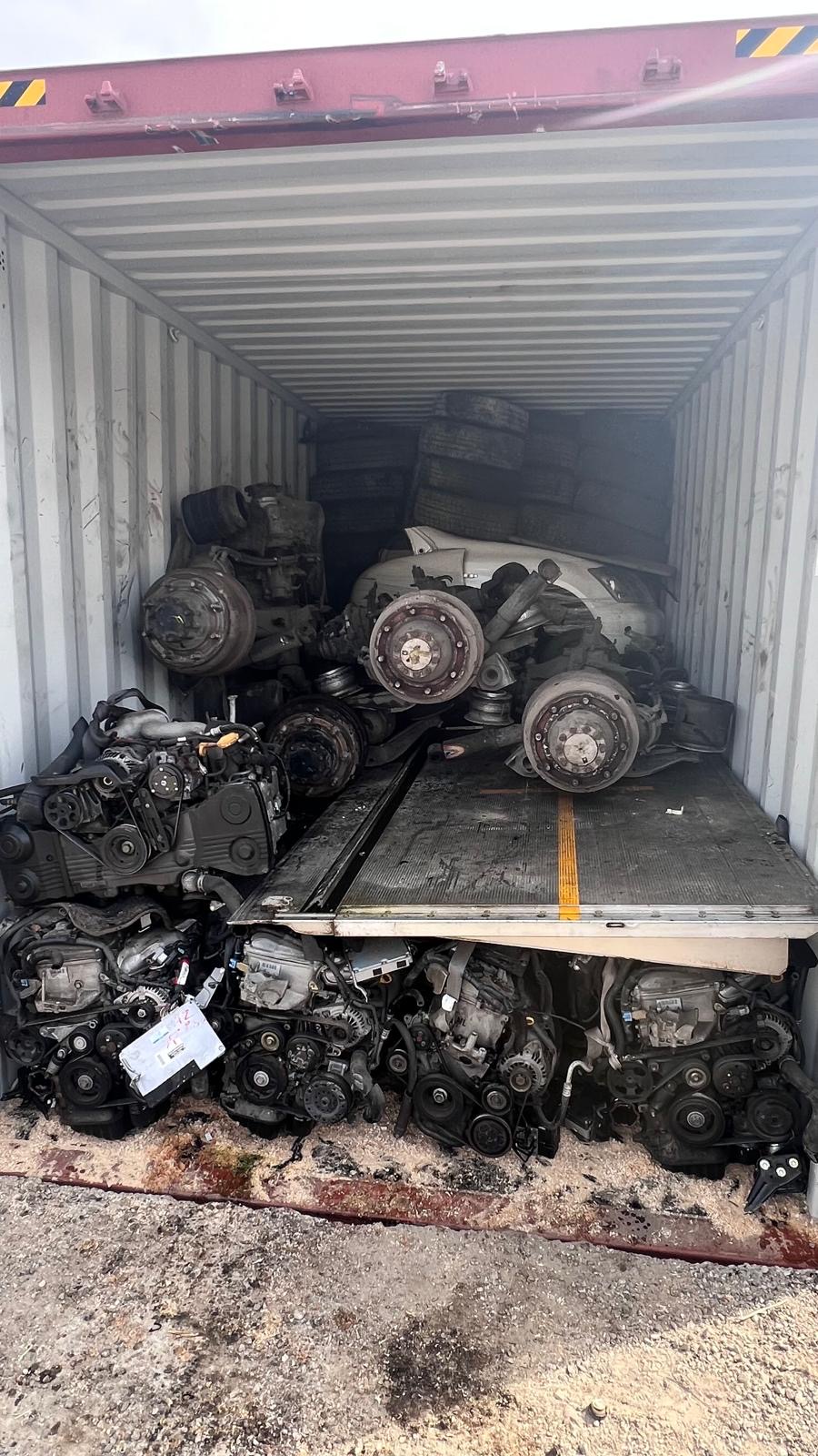 Japan export parts — container worker loading