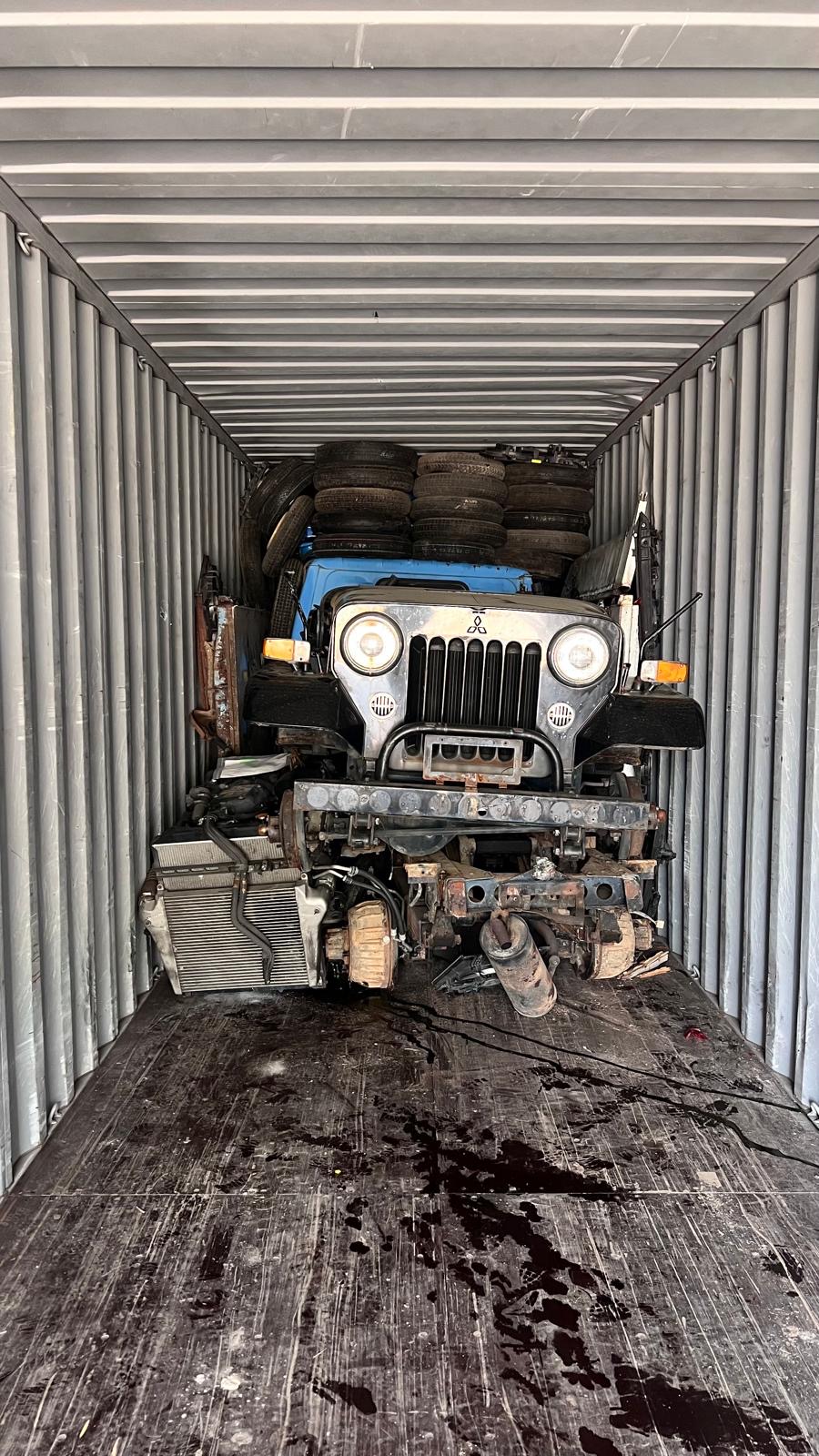 Container — engines and transmissions packed