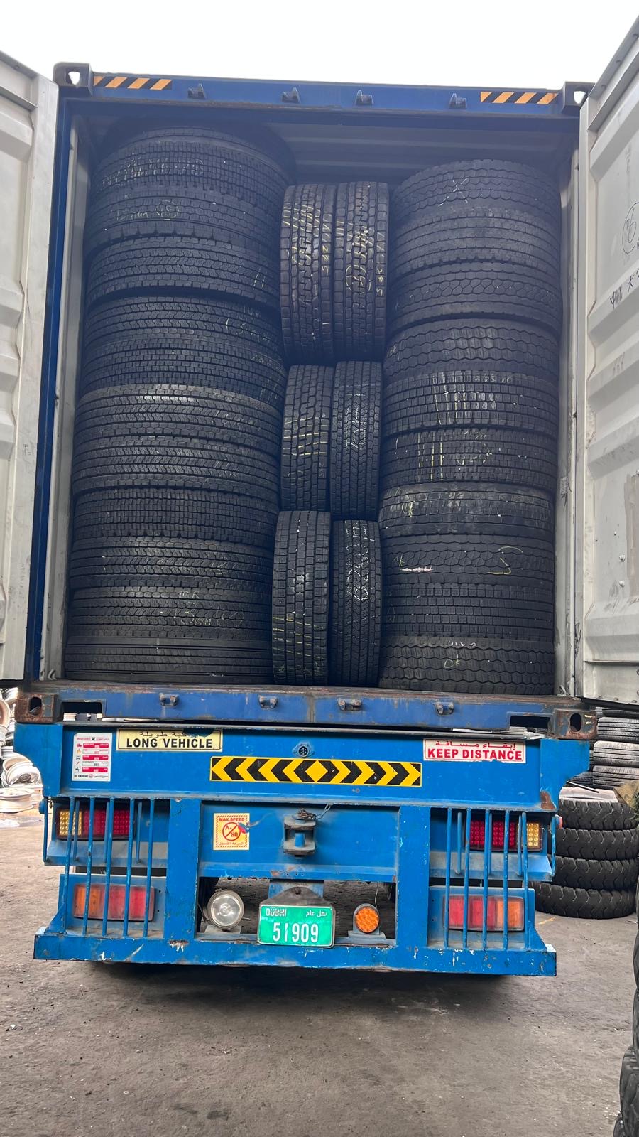 Full-height tyre container — packed end-to-end