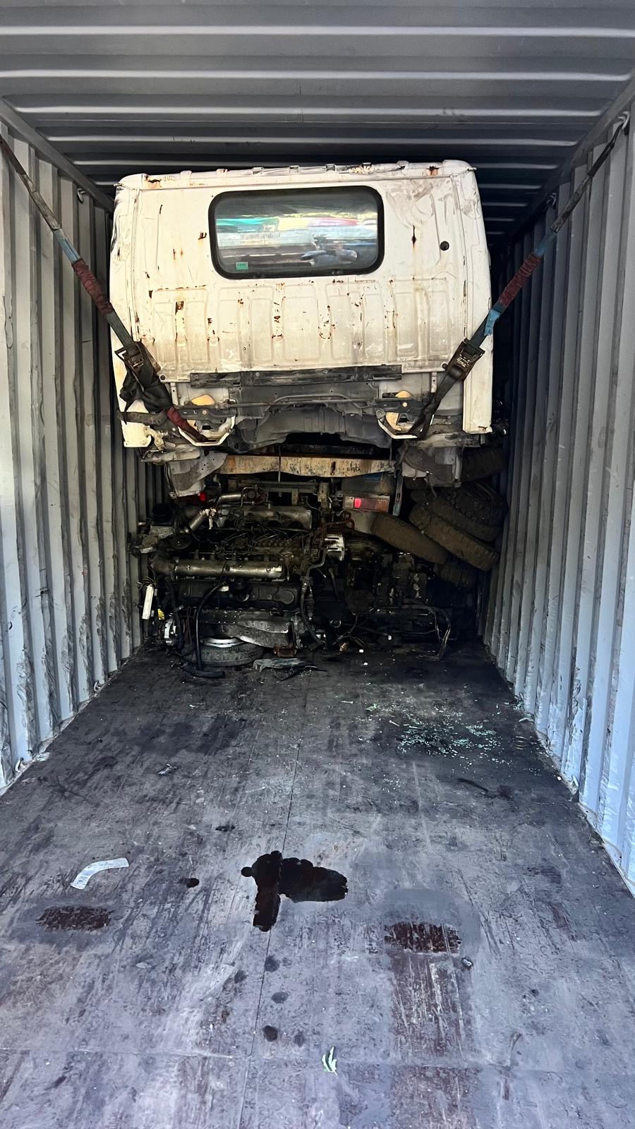 Engine + car bodies — full container load