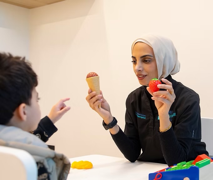 Speech therapy educational materials on table