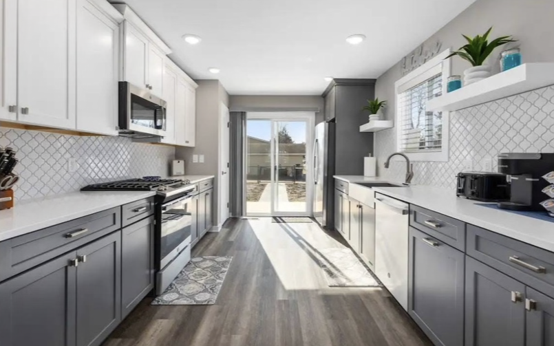 Modern galley kitchen with white and gray cabinetry