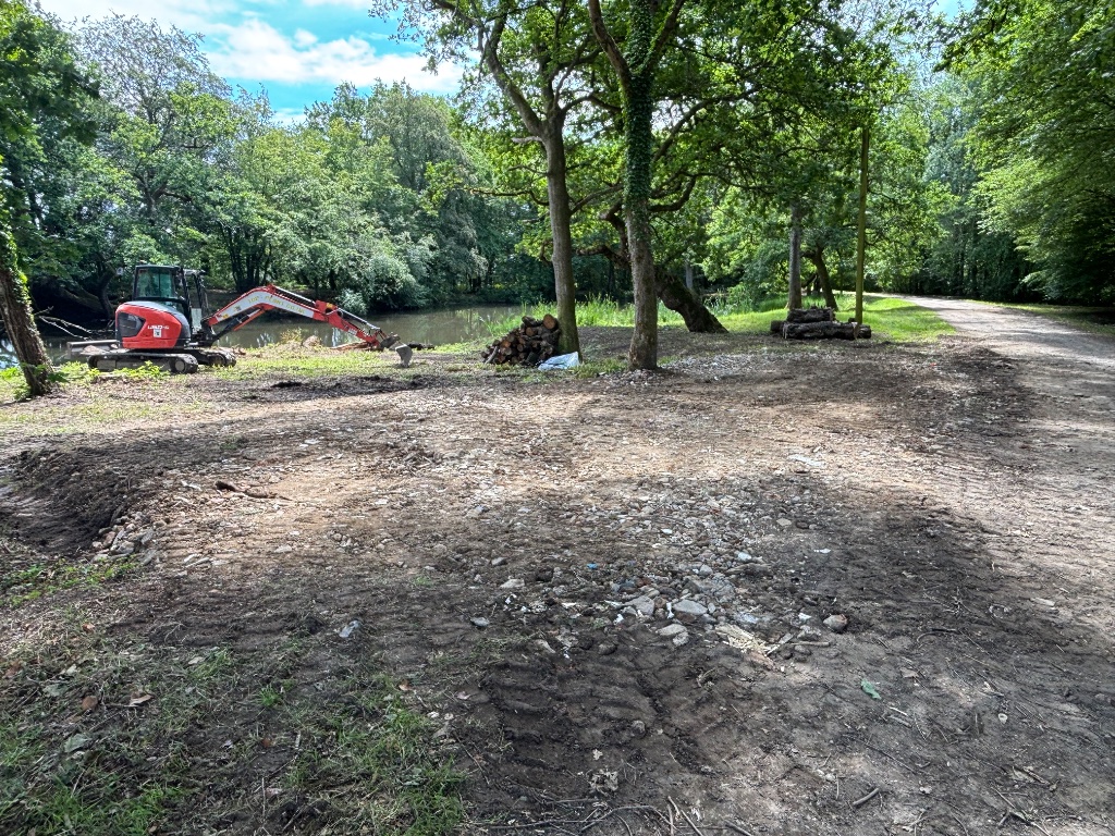 Specialist water management — pond clearance and wildlife area creation by Subsoil Land & Water with excavator on rural land in Kent and East Sussex