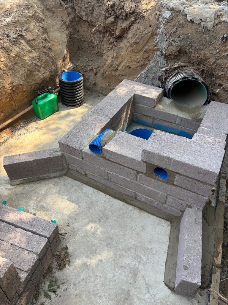 Brick inspection chamber and drainage sump installation for land drainage upgrades in Battle, East Sussex by Subsoil Land & Water groundworks and drainage contractors