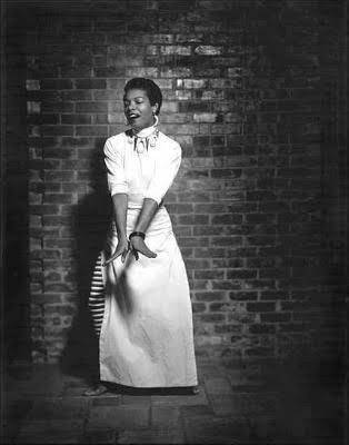 Dr. Maya Angelou — serene, embodied, her hands mid-gesture