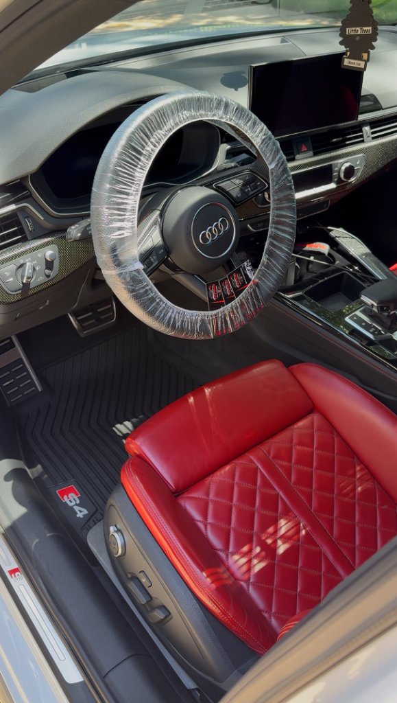 Audi S4 interior with red quilted leather seats freshly detailed
