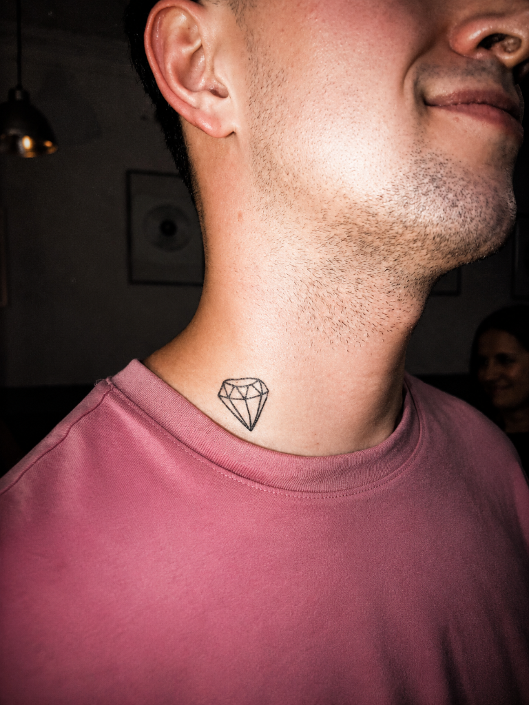 Diamond neck tattoo