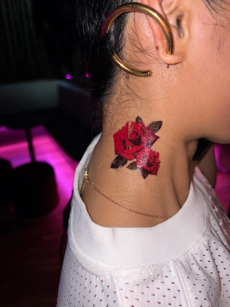 Rose neck tattoo