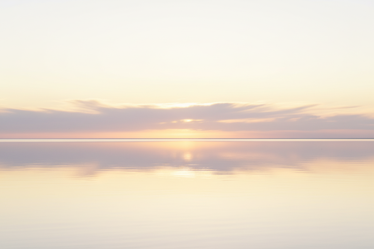 Calm horizon at dawn representing life coaching clarity