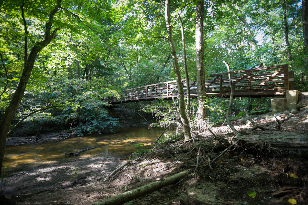 Aman Park footbridge and trail entry