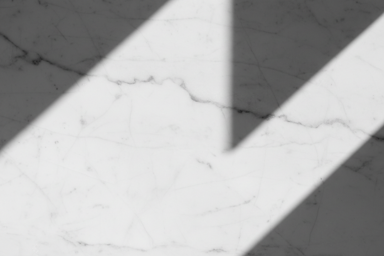 Polished marble surface with subtle grey veining