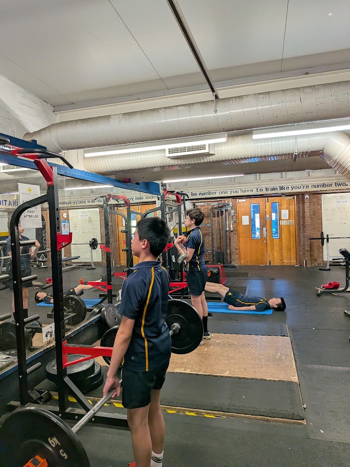 School athletes training with barbells in the S&C Club gym