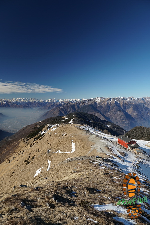 Cyclists ascending a mountain road in Ticino