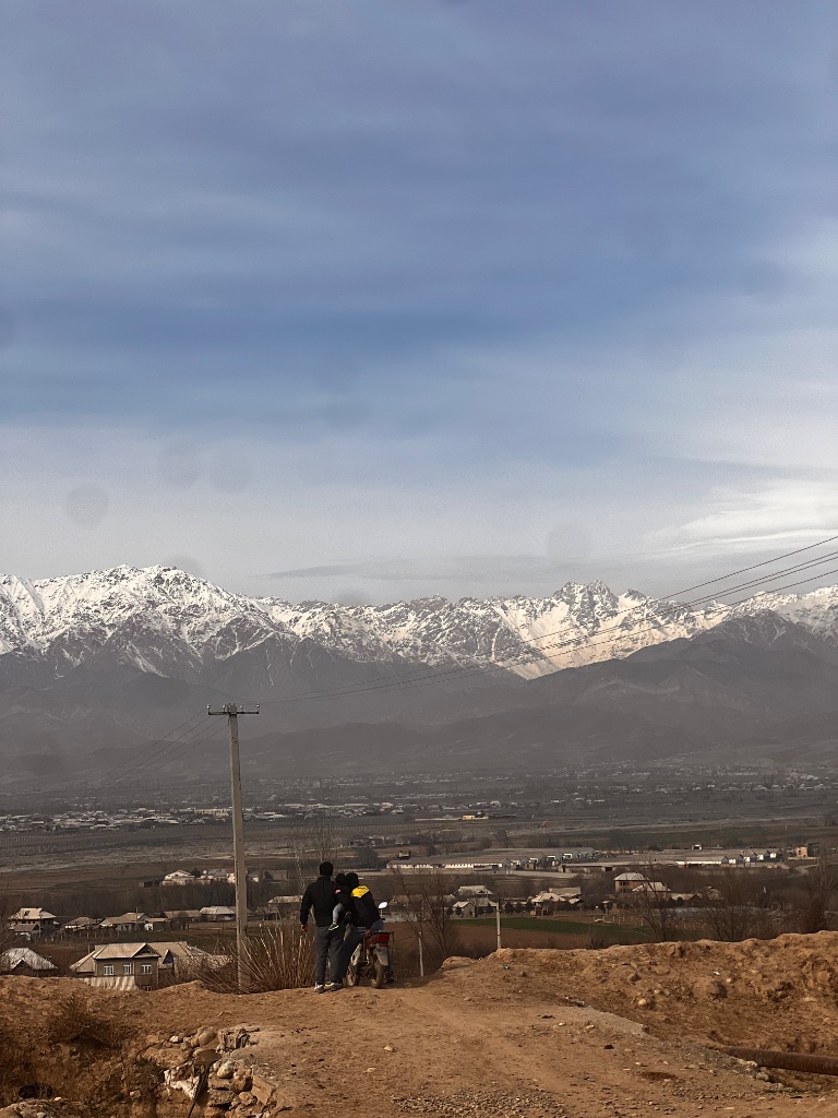 Vast mountain landscape at golden hour, symbolizing the ends of the earth