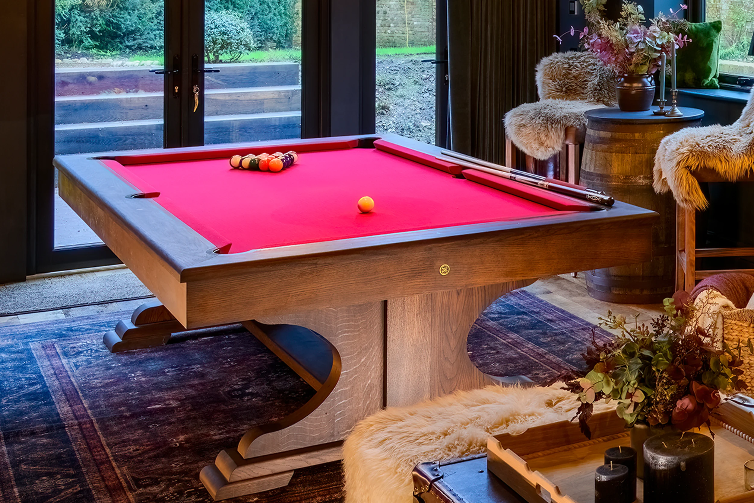 Bespoke Bruno Boulay pool table with red cloth and carved oak pedestal base