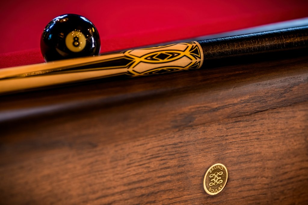 Hand-finished solid brass pocket detail on bespoke pool table