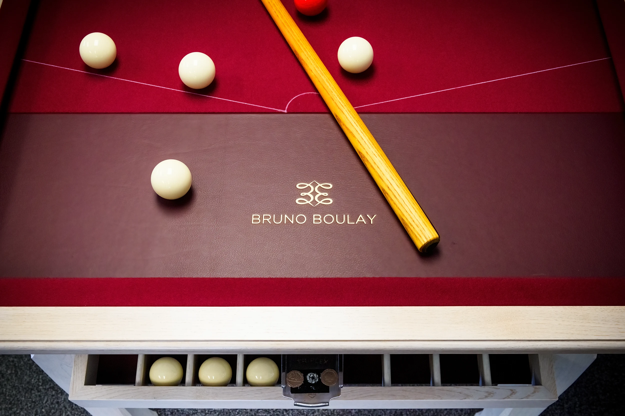 Handmade bar billiards table with burgundy playing surface and Bruno Boulay monogram