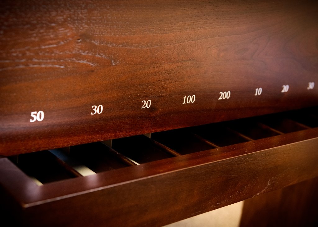Solid hardwood cabinetry detail on a handmade bar billiards table