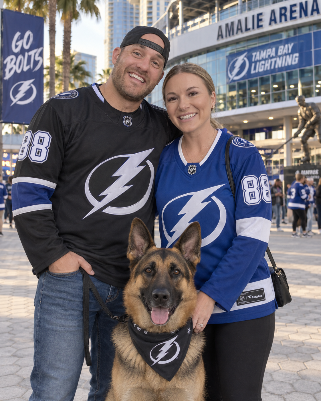 DSC founders with their German Shepherd at Amalie Arena