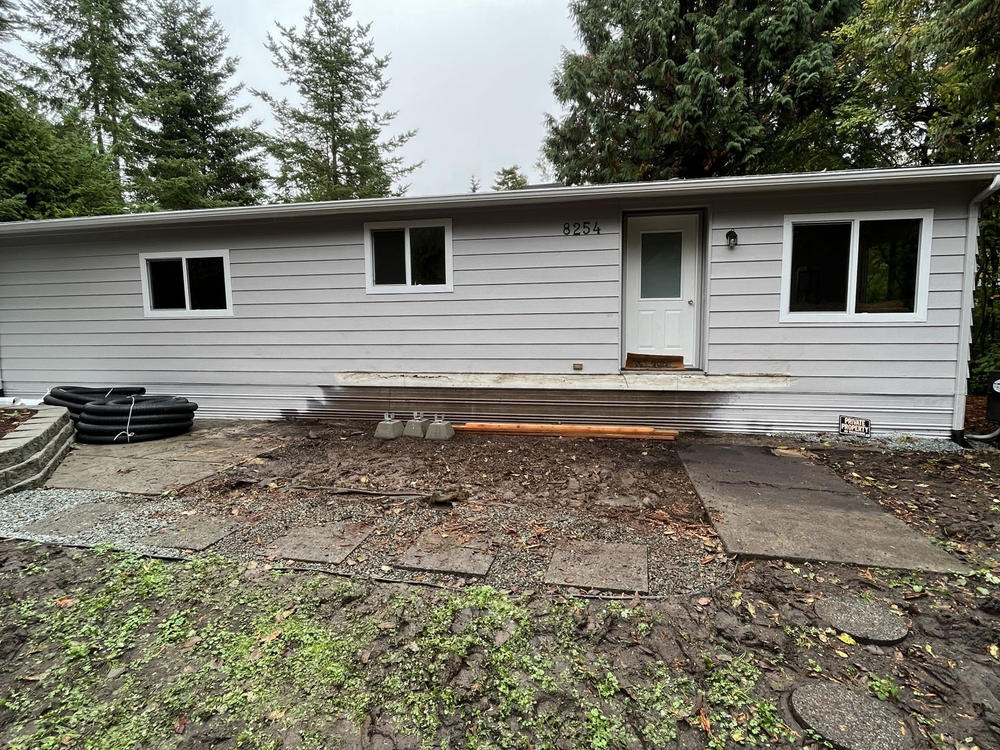 Exterior view of a mobile home property after junk removal services performed by Junk Away in Bellingham, WA.