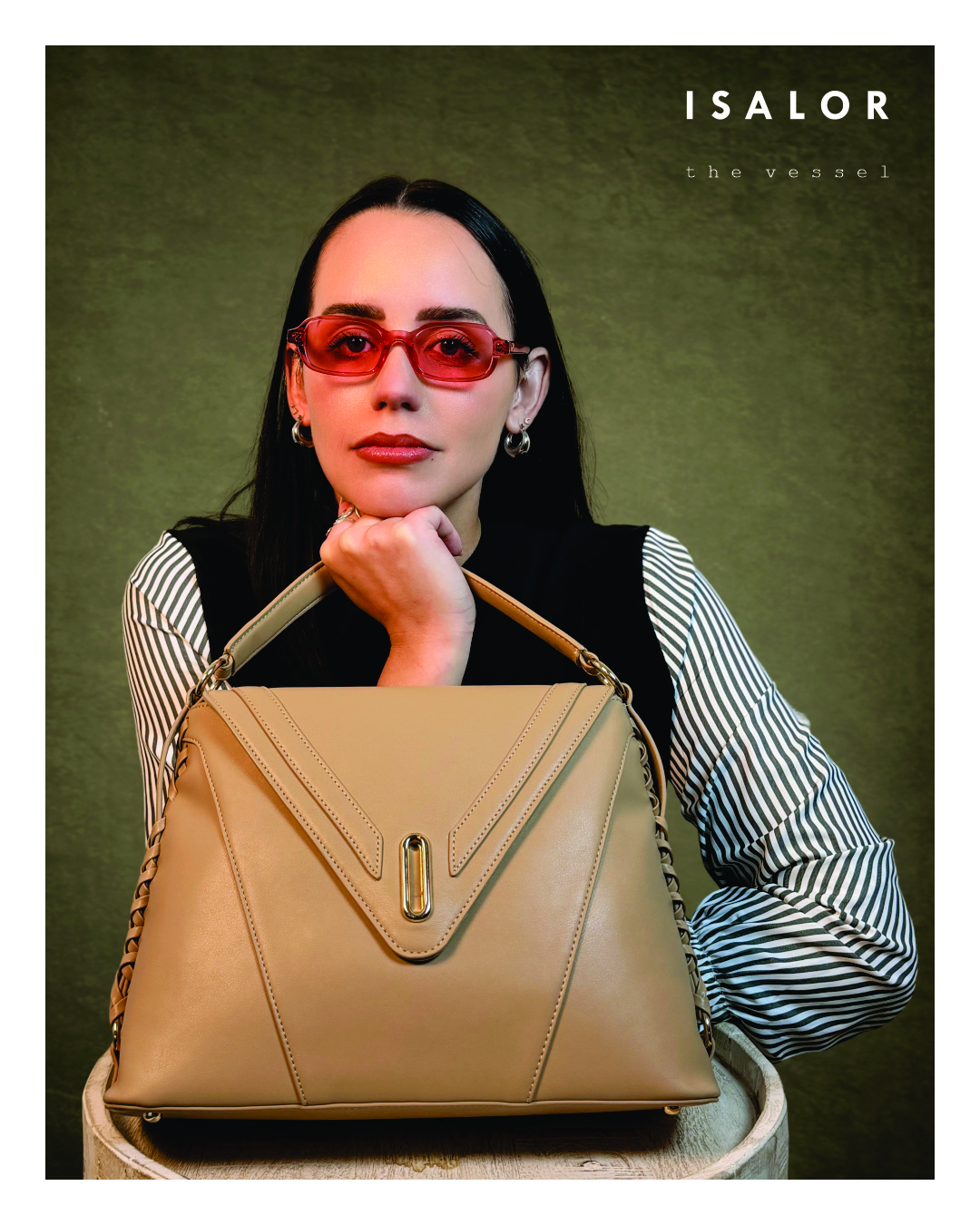 The Vessel bag held by hand