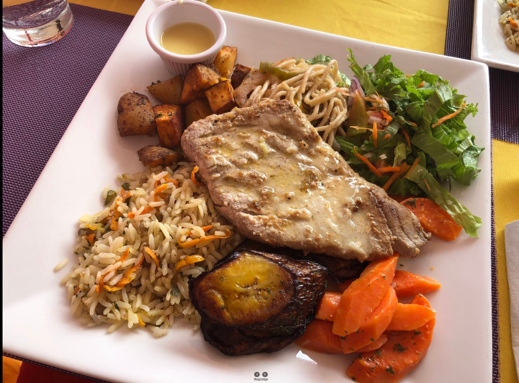 Grilled fish with rice and vegetables
