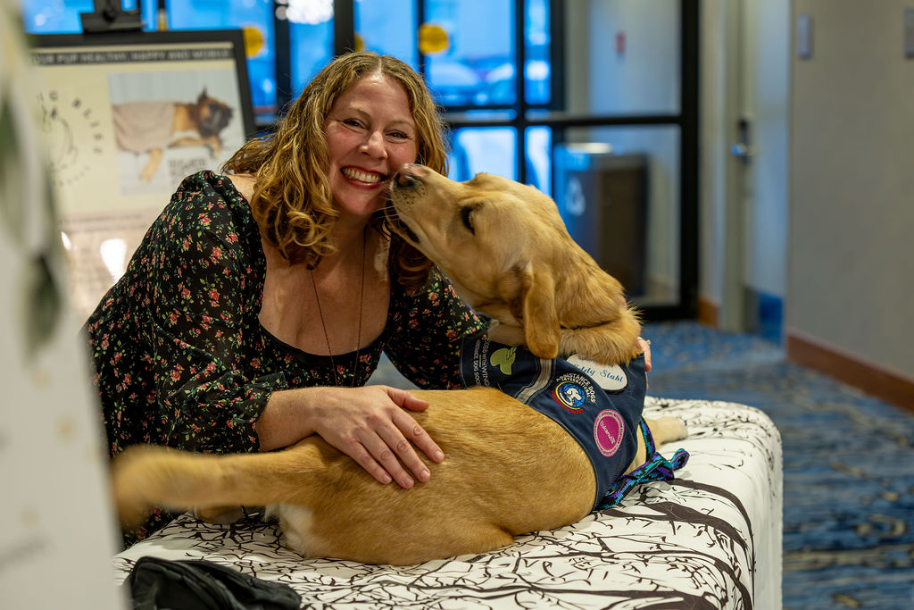 Gala 2025 handler and service dog sharing a joyful moment