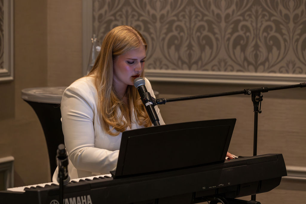 Gala 2025 pianist performing during reception