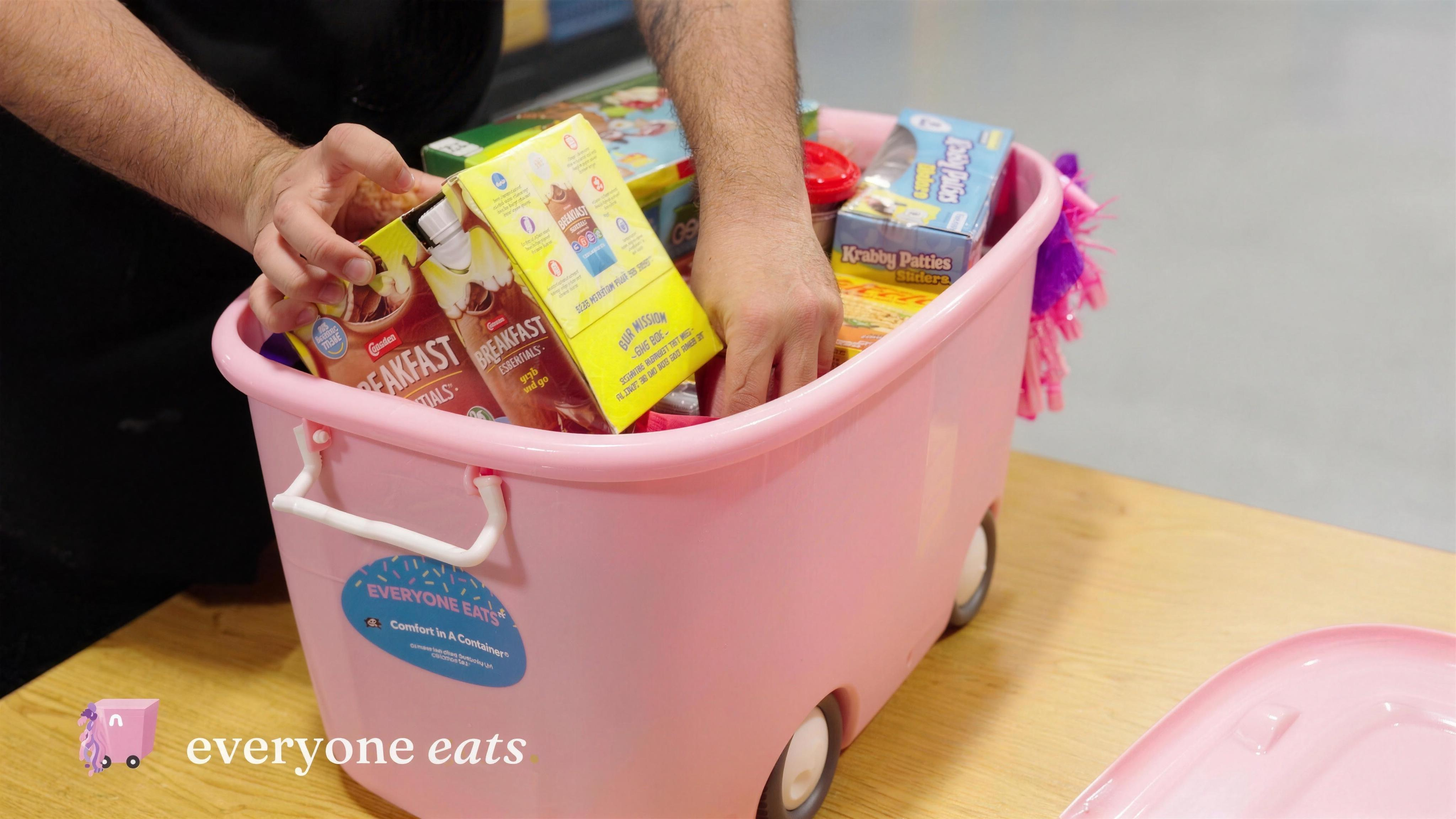 Breakfast essentials and snacks packed into the pink canister, ready for delivery.