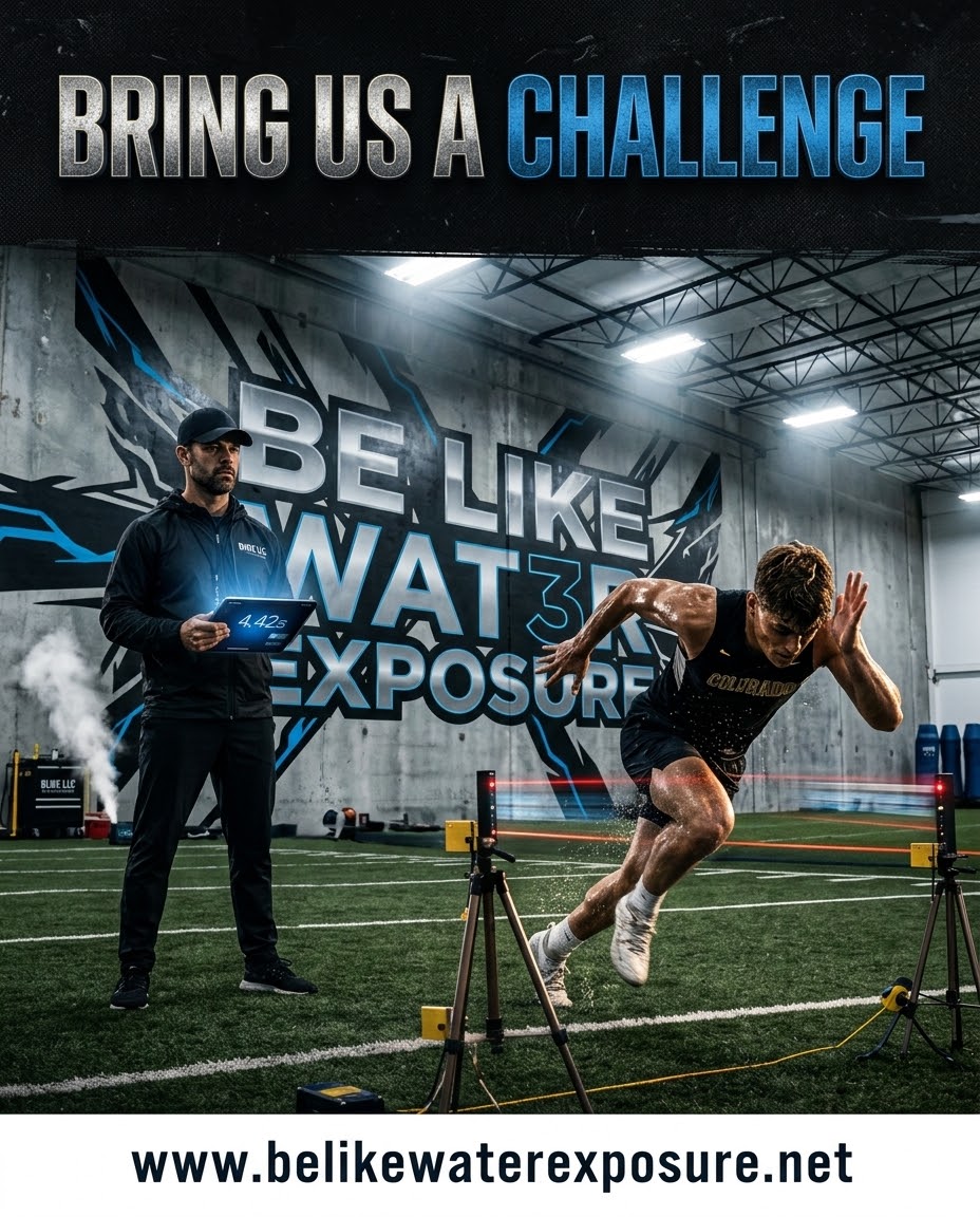 Football athlete sprinting through indoor timing equipment