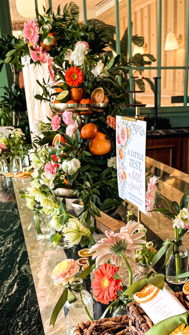 Baby shower decor with floral centerpieces in St. Petersburg, FL by Two Sisters Events