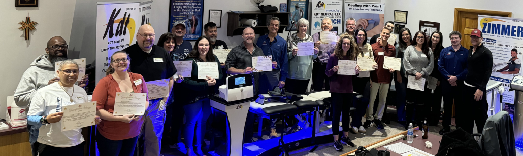 KDT spinal decompression certification course graduates holding their certificates