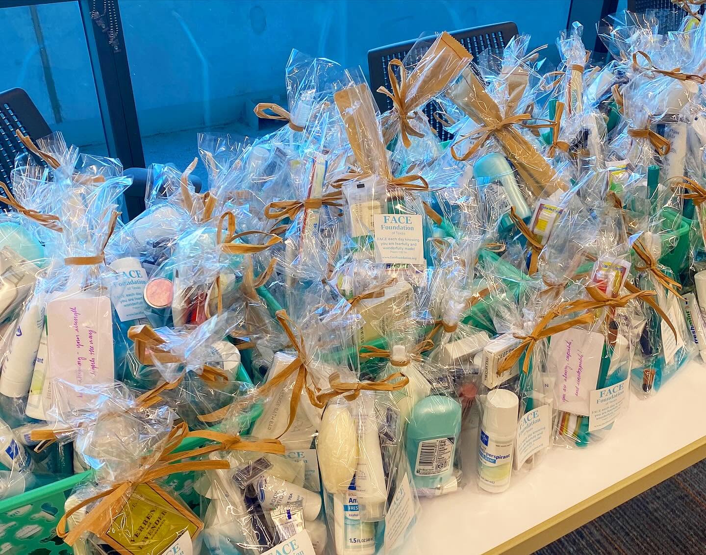 A large collection of completed FACE bags ready for delivery