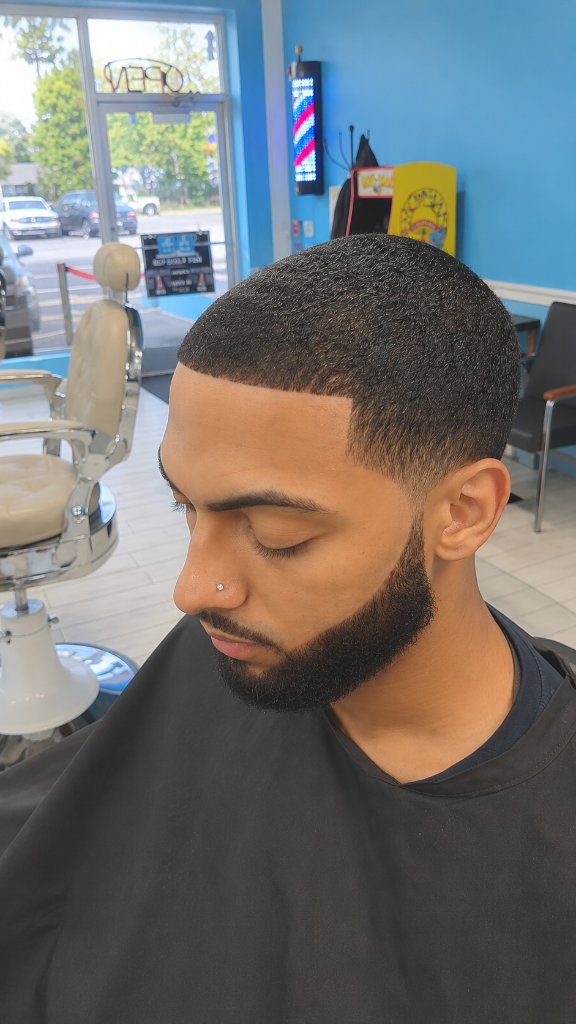 Man with fresh haircut in barbershop