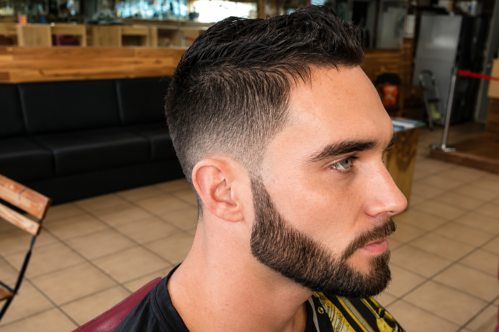 Man with beard and taper fade