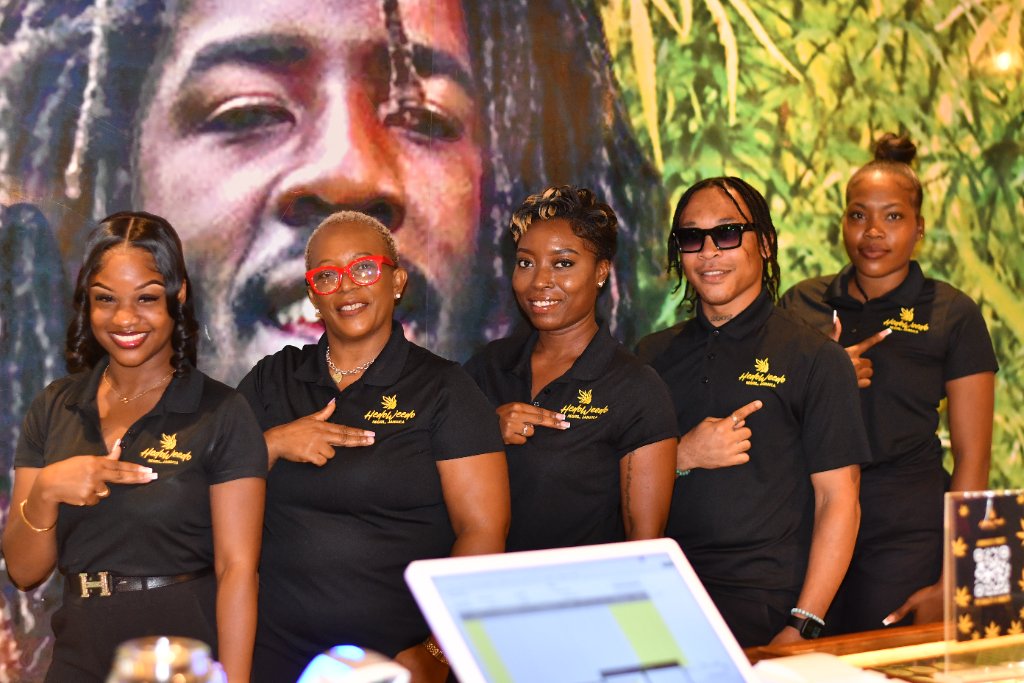 HedoWeedo team in front of Bob Marley mural