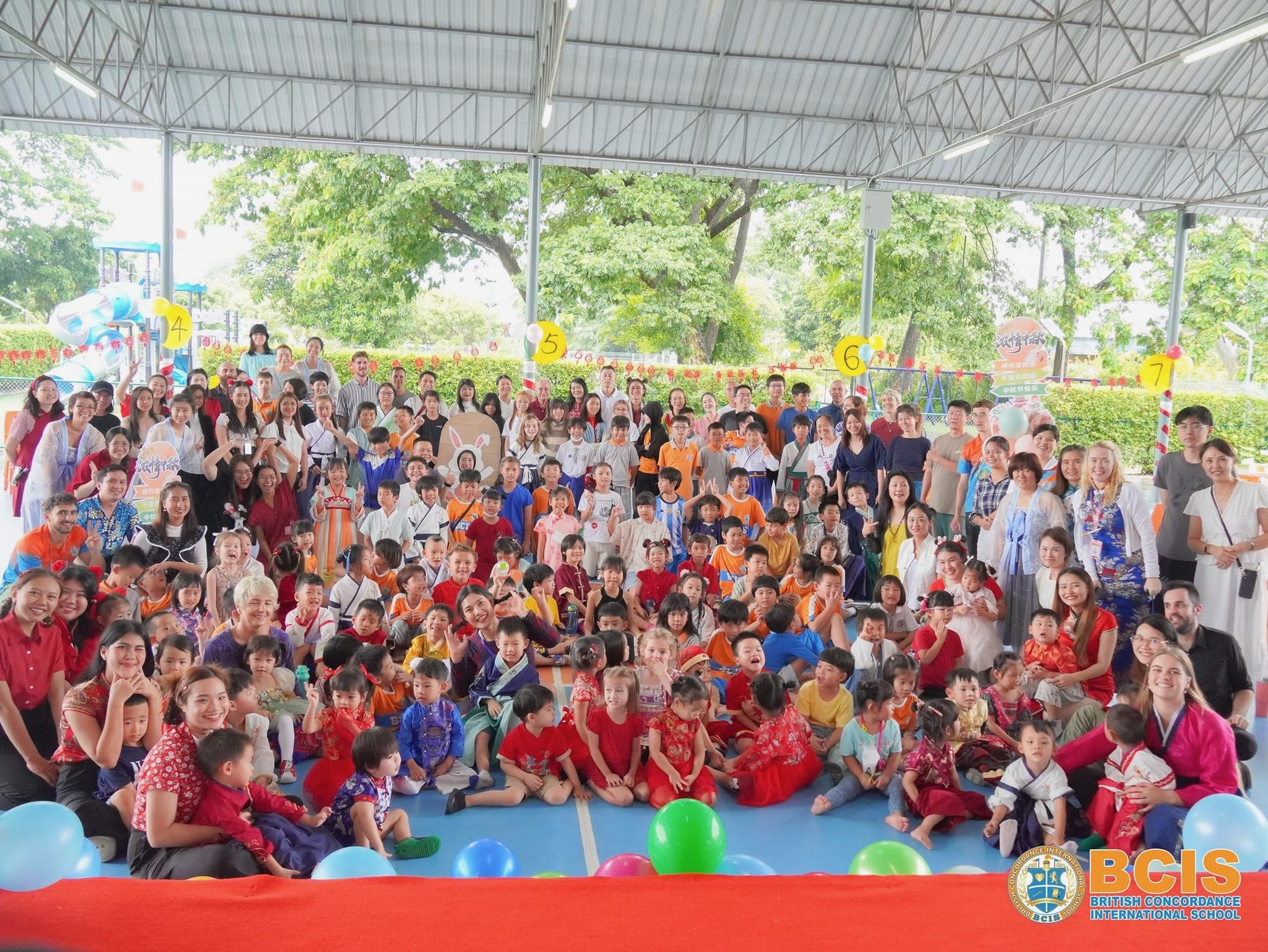 British Concordance International School assembly under the sports pavilion