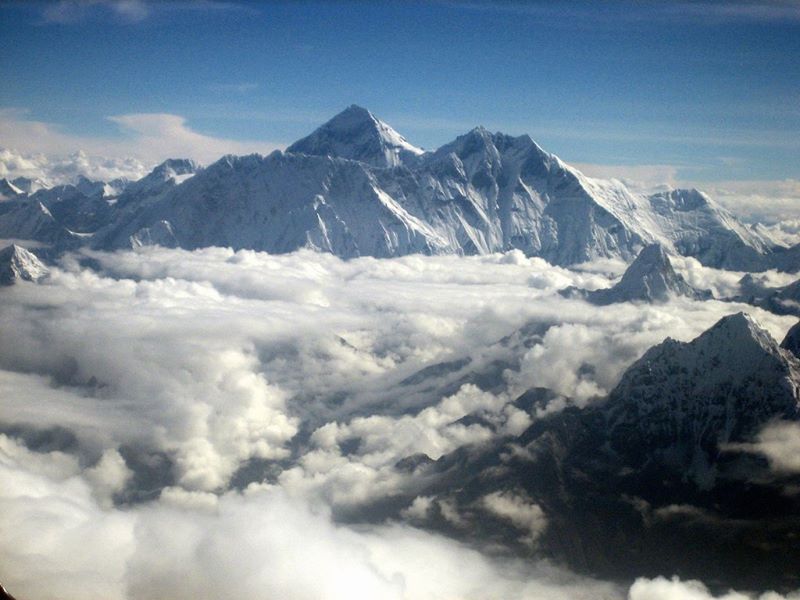Aerial view of snow-capped Himalayan peaks above the clouds, Nepal