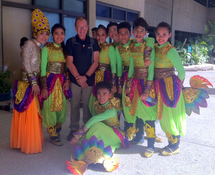 Paul Penfold with traditional Filipino dancers in colourful costumes, Philippines