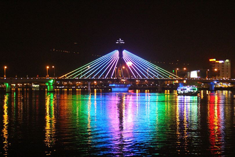 Illuminated cable-stayed bridge over the Han River at night, Da Nang, Vietnam