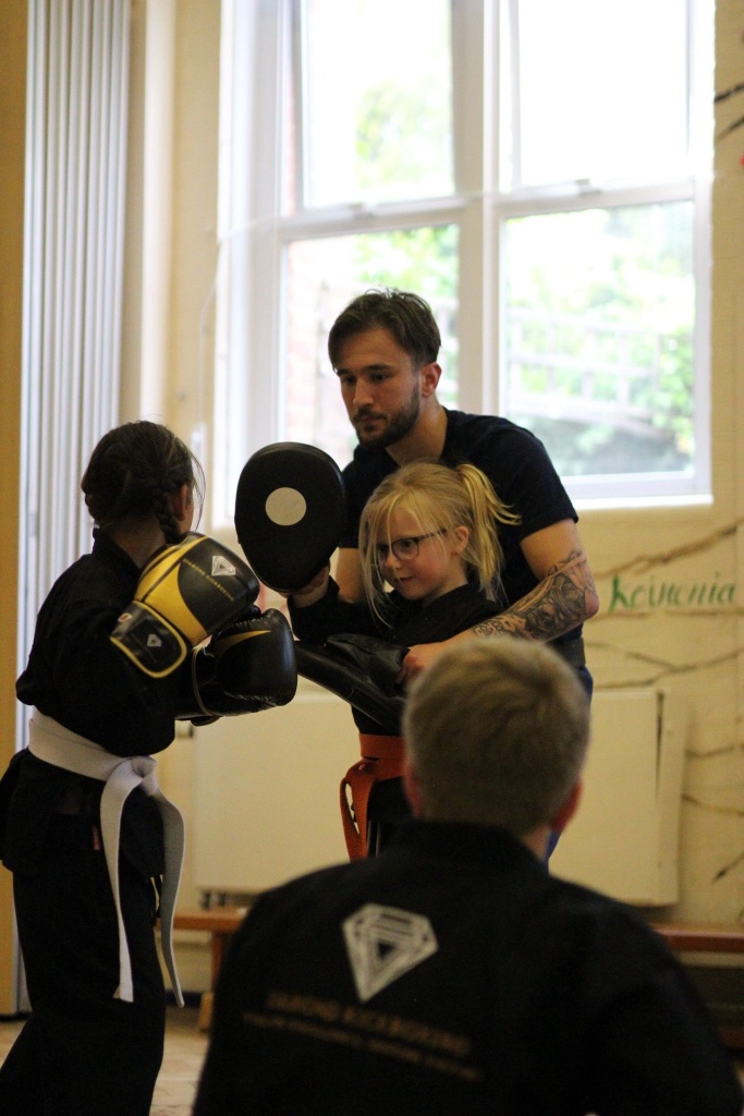Coach Sam pad work