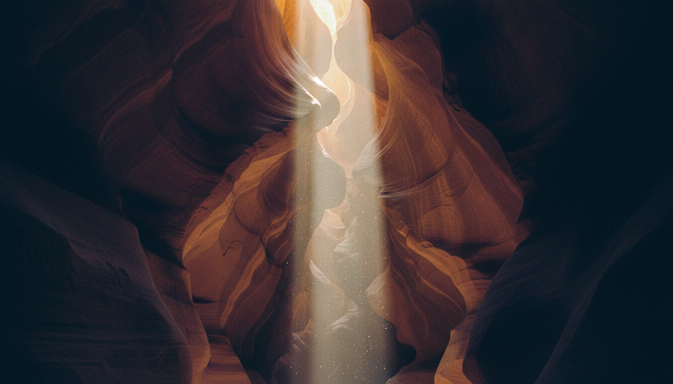 Canyon with golden light streaming down through ancient stone walls
