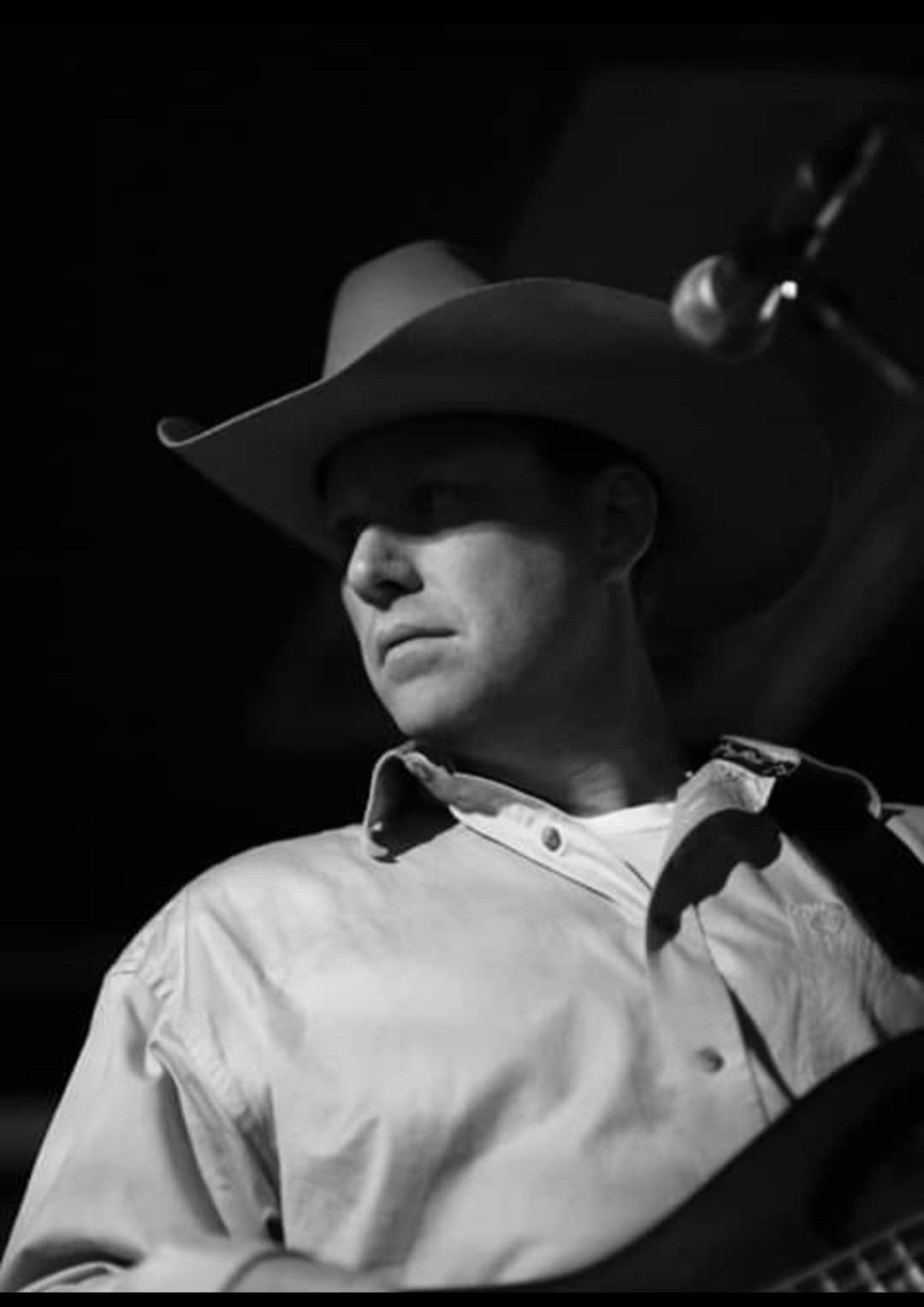 Gary wearing a cowboy hat, black-and-white portrait