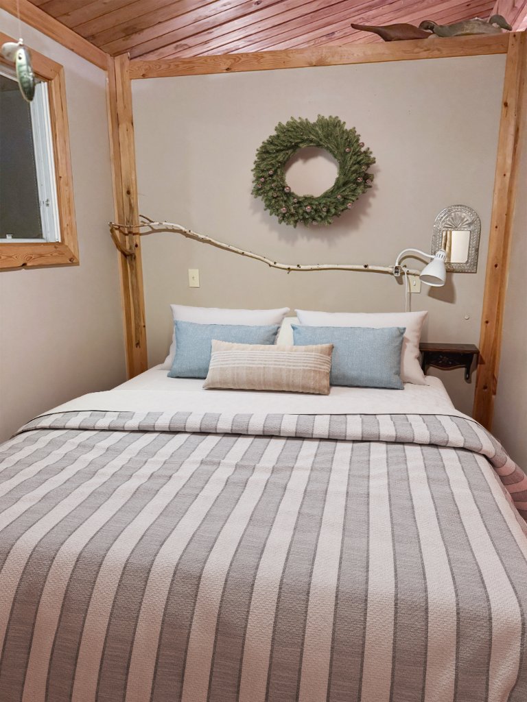 Main cottage bedroom that sleeps two to three