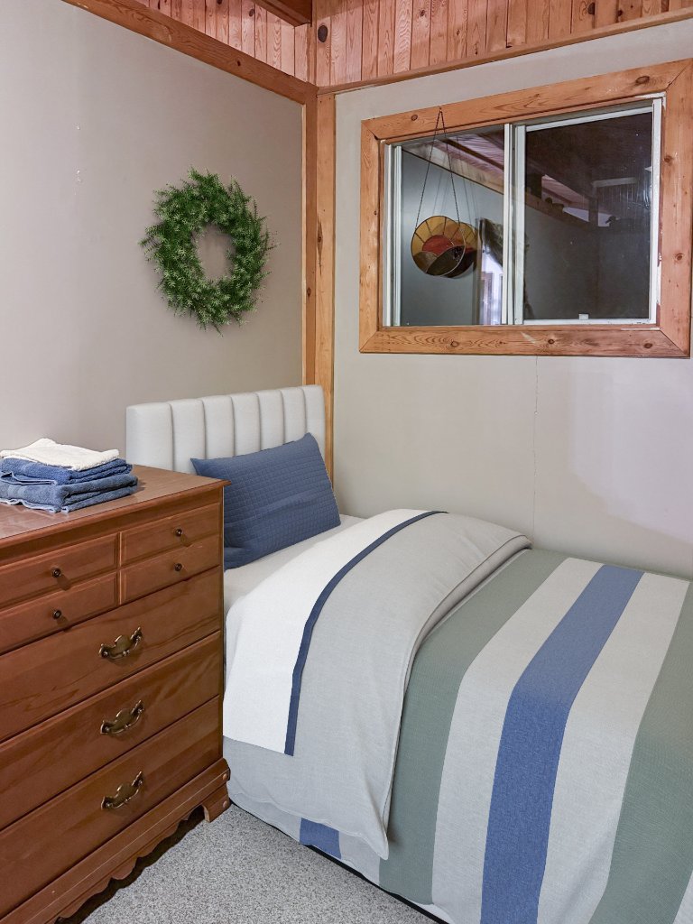 Second main cottage bedroom that sleeps two to three